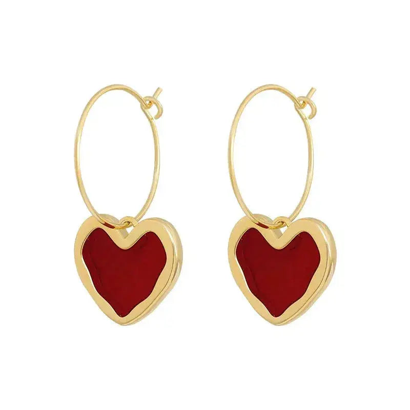 Heart earrings in gold Unique Joyas