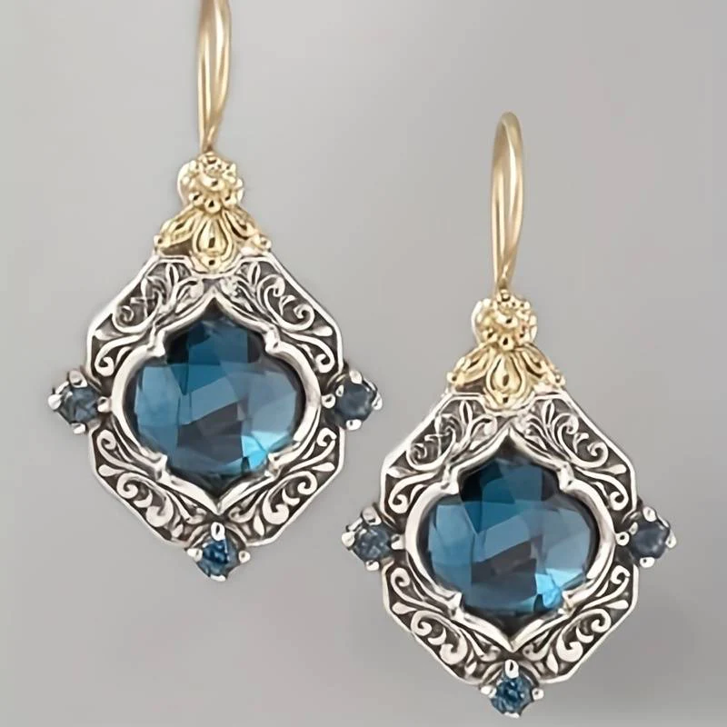 Blue crystal earrings in gold and silver