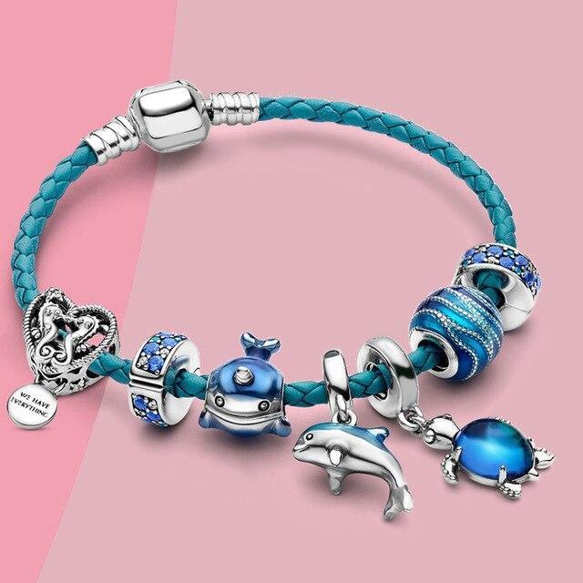 Ocean style armband + charms in leder und silber enthalten